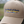 Beige cap with 'Tack Shack of Ocala' branding on a blurred background