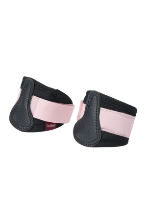 Pair of black protective boot covers with pink bands on a white background