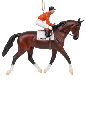 Model horse with rider on a white background