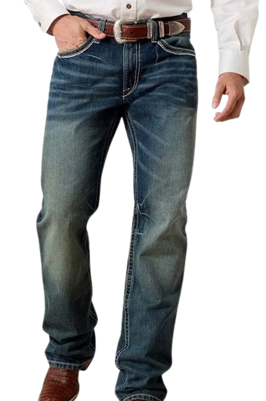 Blue jeans worn by a person on a white background