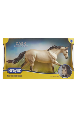 Breyer model horse in packaging with a white horse on a grassy field